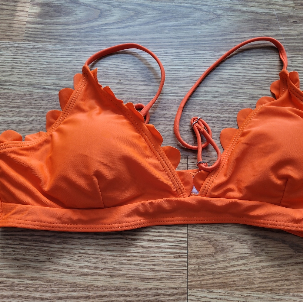 2/$35 NWOT bikini top. Marked XL but I would say more of a M/L at best